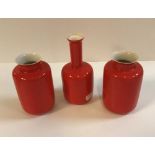 A pair of Chinese Jingdezehen Middle Kingdom designed by Bo Jia, oxide red ground vases,