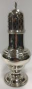 A Chester silver baluster shaped sugar caster of typical form raised on a circular foot (loaded)