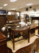 An early 19th Century Norfolk fruitwood dining chair with typical curved seat on square tapered