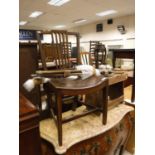 An early 19th Century Norfolk fruitwood dining chair with typical curved seat on square tapered