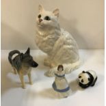 A collection of ornamental wares to include Royal Doulton Persian cat, No'd.
