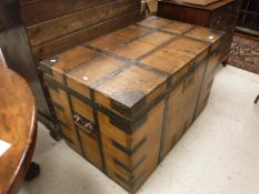 A 19th Century iron bound stained pine silver chest,