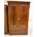 A Victorian figured mahogany wardrobe,