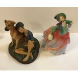A collection of Royal Doulton figurines comprising "Buddies" (HN2546), "Autumn Breezes" (HN1911),
