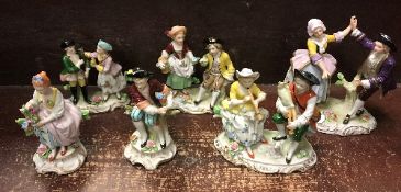 A collection of nine various Sitzendorf figure groups,