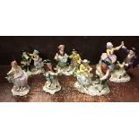 A collection of nine various Sitzendorf figure groups,