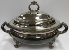 An Old Sheffield Plate oval tureen and cover bearing lozenge stamp with crossed arrows (for William