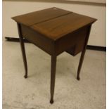 An Edwardian mahogany and inlaid writing table,