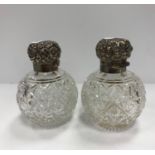 A pair of silver mounted hobnail cut glass grenade scent bottles 11.
