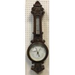 A circa 1900 oak cased barometer thermometer, 71.