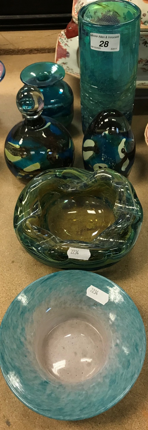 A collection of Mdina glass to include tubular vase, 20 cm high, two paperweights and wavy bowl,