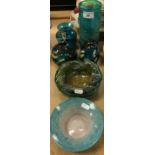 A collection of Mdina glass to include tubular vase, 20 cm high, two paperweights and wavy bowl,