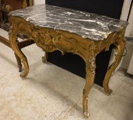 A 19th Century Continental carved giltwood and gesso framed pier table with white veined grey