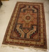 A modern Mahal rug, the central medallion on a blue and red and cream ground,
