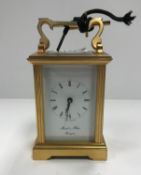 A brass cased carriage clock,