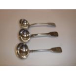 A pair of George IV silver fiddle pattern sauce ladles (London 1828 by T.