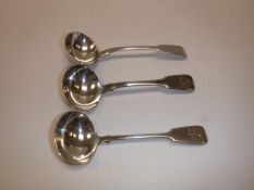 A pair of George IV silver fiddle pattern sauce ladles (London 1828 by T.