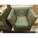 An early 20th Century green upholstered and floral spray needlework decorated knowle chair of