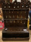 A 19th Century provincial oak spoon rack of two tiers with box and recess to base, 34.