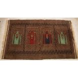 An Anatolian prayer rug, the central panel set with four repeating panels, each with Mirhab design,