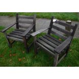 A pair of slatted teak garden elbow chairs, 68.