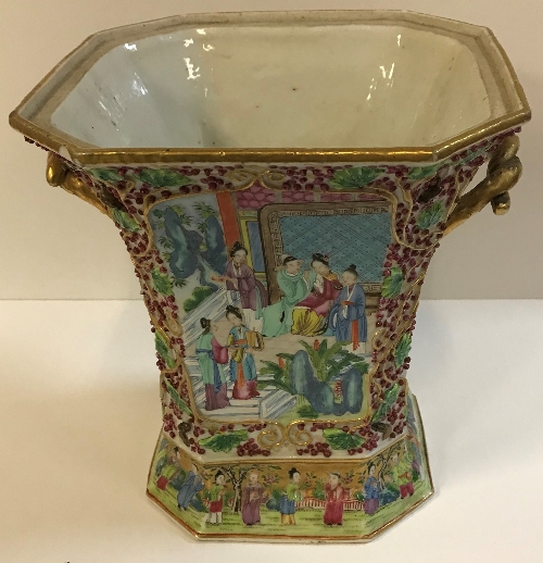 A 19th Century Chinese famille rose and relief work decorated vase of canted square tapered form,