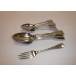 Four Victorian silver fiddle pattern tablespoons, various dates and makers, four dessert spoons,