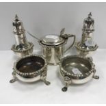 A late Victorian silver five-piece cruet comprising pair of peppers,
