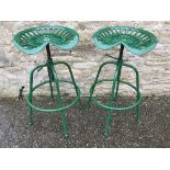 A pair of modern cast metal green painte