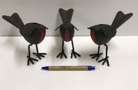 A set of three modern tin plate Robins,