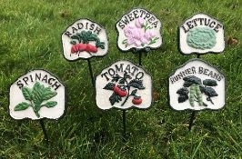 A set of six cast iron salad signs inscr