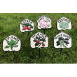 A set of six cast iron salad signs inscr