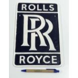 A modern painted cast metal sign "Rolls