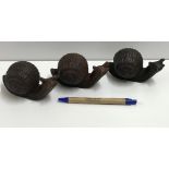 A set of three cast metal Snails, approx