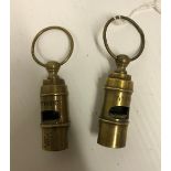 Two modern reproduction brass whistles i