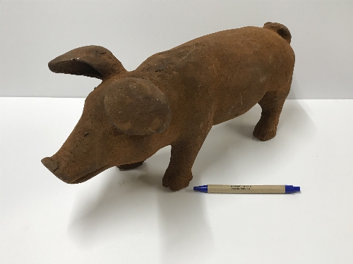 A cast iron Pig ornament with rust effec