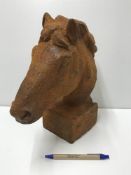 A cast iron Horse head on square base wi