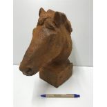 A cast iron Horse head on square base wi