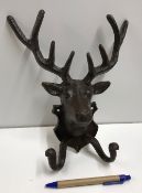 A deer head coat hook, approx 17 cm high