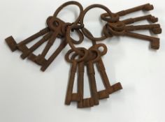 Three sets of cast metal ornamental keys