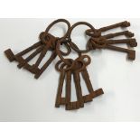 Three sets of cast metal ornamental keys