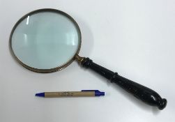 A large decorative magnifying glass with