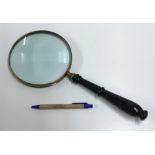 A large decorative magnifying glass with