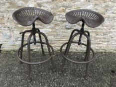 A pair of modern cast metal patinated ad