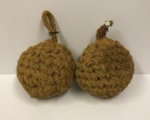 A pair of 12" coir ball fenders