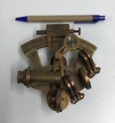 A modern decorative brass sextant inscri