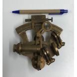 A modern decorative brass sextant inscri