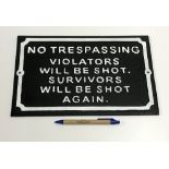 A modern painted cast metal sign "No Tre