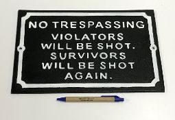 A modern painted cast metal sign "No Tre