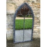A garden mirror of Gothic arch form, app